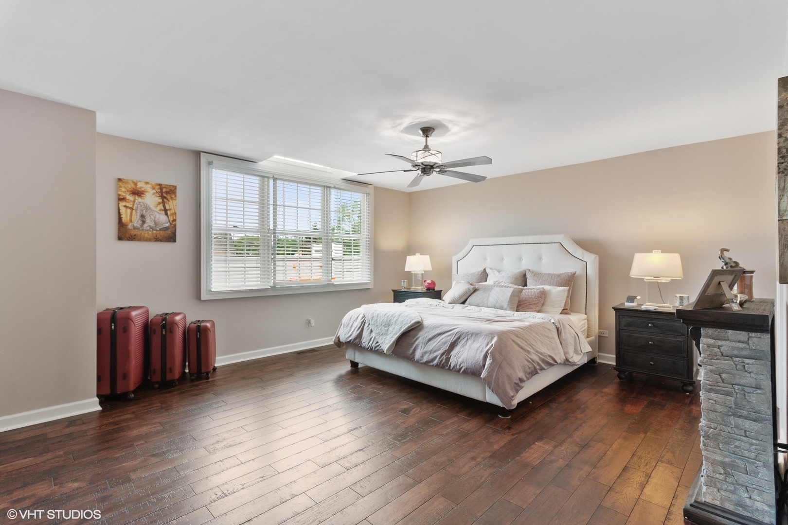 972 West Irving Park Road, Unit 3 Bensenville, IL 60106 - Photo 10 of 19 a spacious bedroom with a bed and wooden floor
