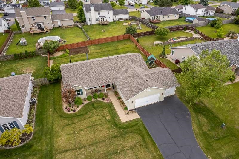 10972 Chicory Ridge Way Roscoe, IL 61073 - Photo 54 of 54 an aerial view of a house with a garden