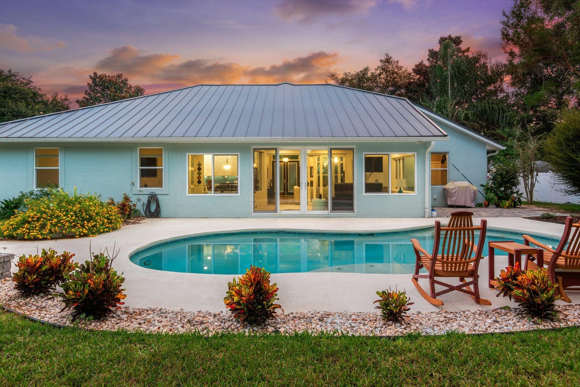 3432 Kings Road South St. Augustine, FL 32086 - Photo 2 of 47 a front view of a house with garden
