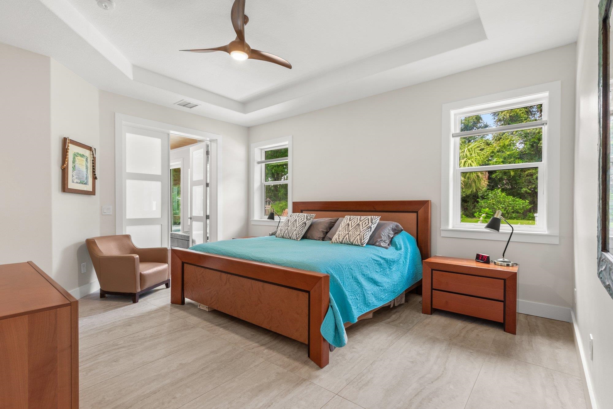 3432 Kings Road South St. Augustine, FL 32086 - Photo 21 of 47 a bedroom with a bed couch and window