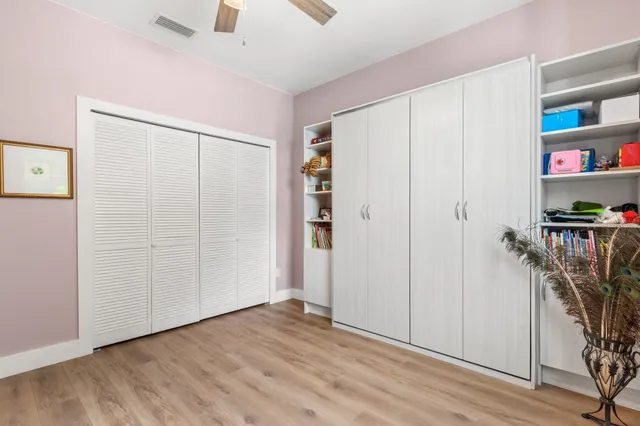 an empty room with shelves