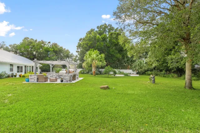 a view of a house with a big yard