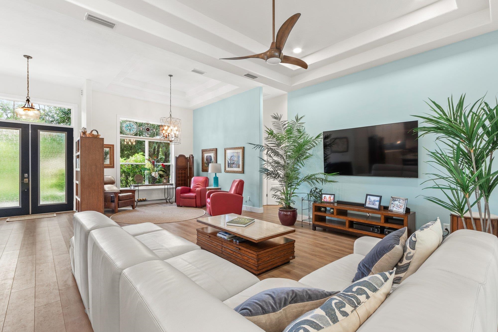 3432 Kings Road South St. Augustine, FL 32086 - Photo 7 of 47 a living room with furniture and a flat screen tv