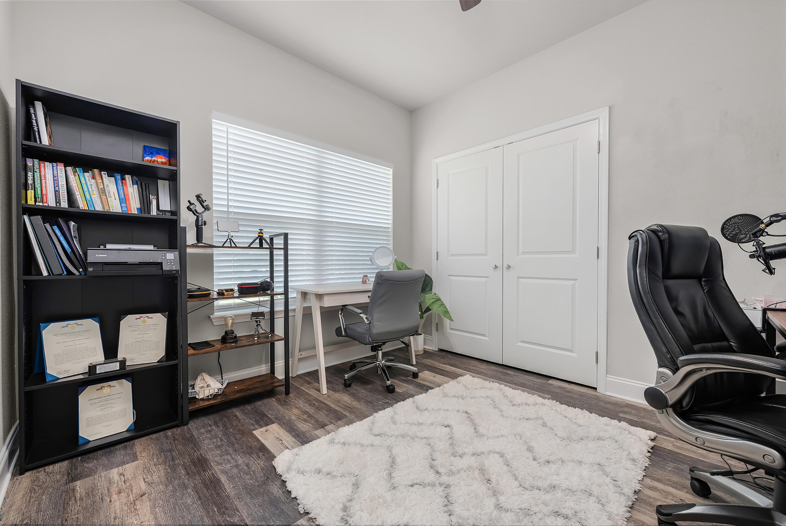 820 Hilltop Road Mary Esther, FL 32569 - Photo 11 of 47 a view of a bedroom with workspace and a window