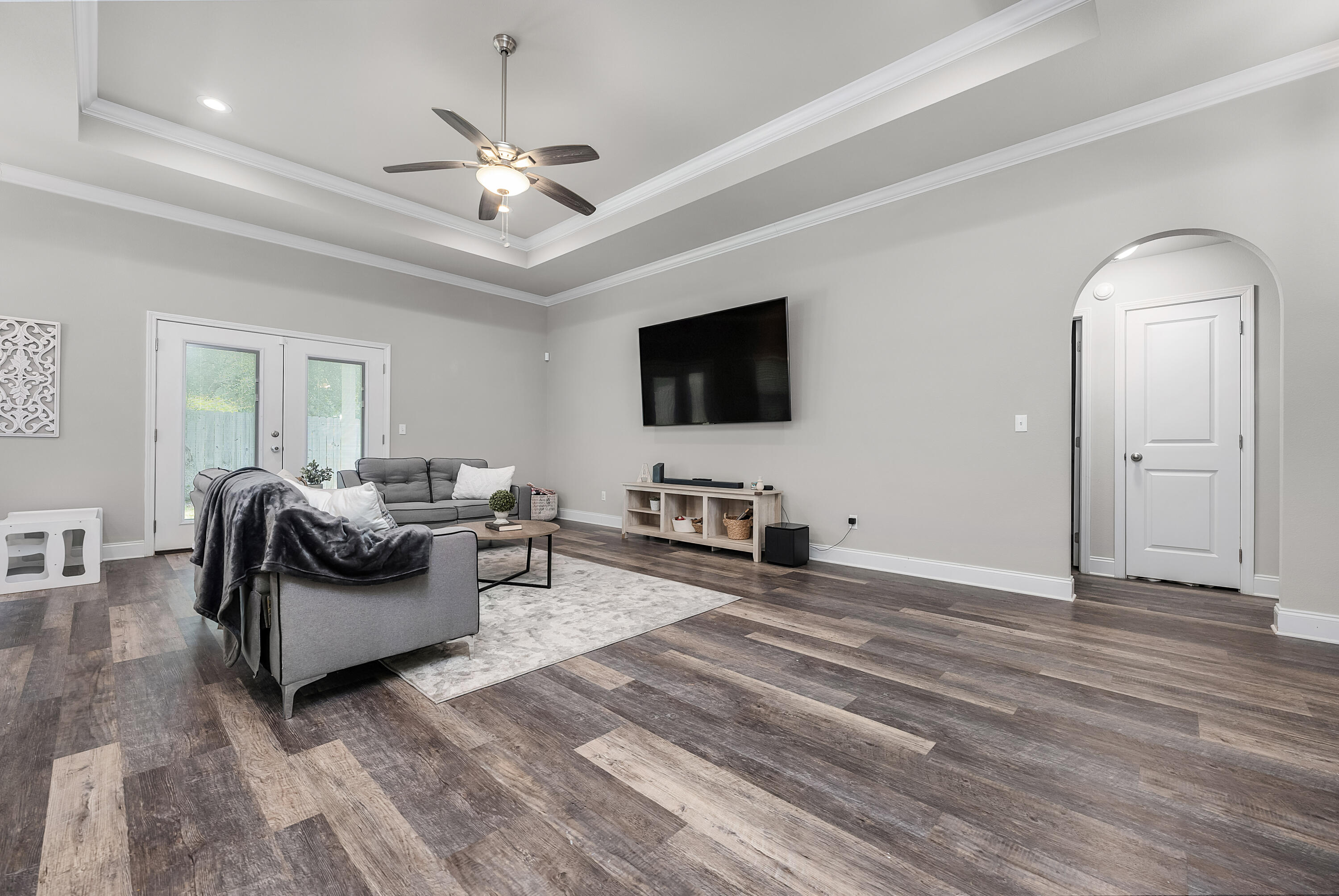 820 Hilltop Road Mary Esther, FL 32569 - Photo 15 of 47 a living room with furniture and a flat screen tv