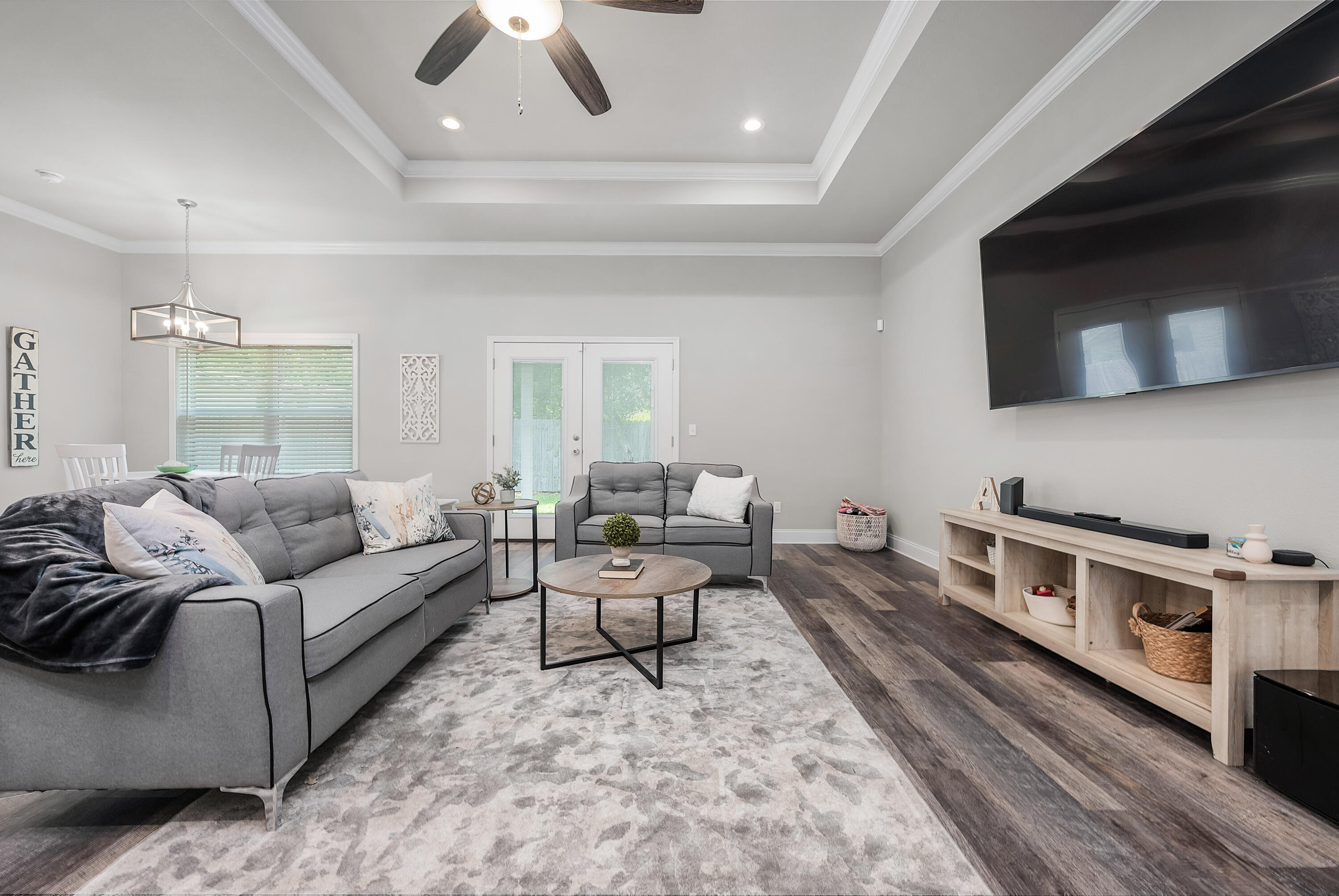 820 Hilltop Road Mary Esther, FL 32569 - Photo 16 of 47 a living room with furniture and a flat screen tv