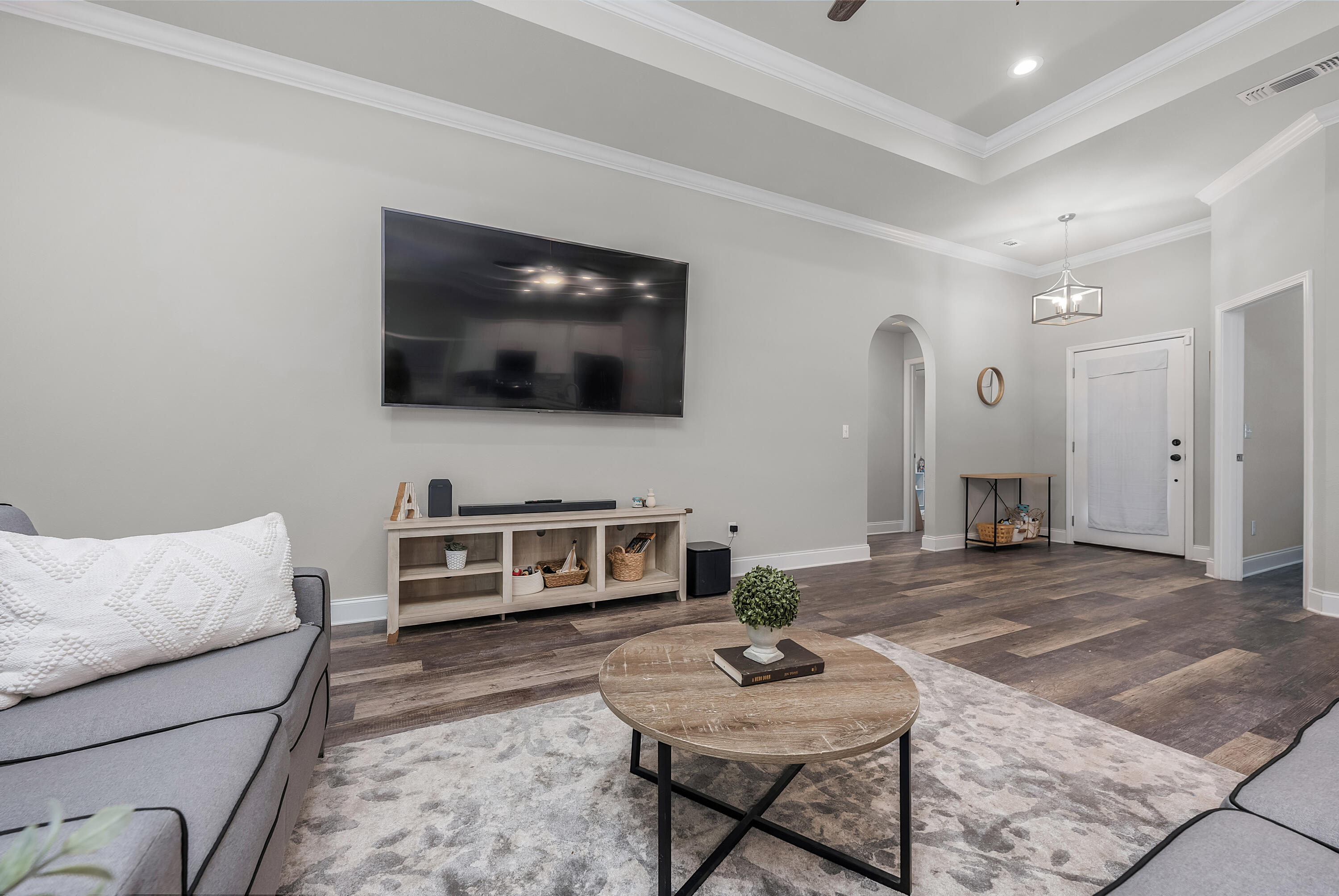 820 Hilltop Road Mary Esther, FL 32569 - Photo 19 of 47 a living room with furniture and a flat screen tv