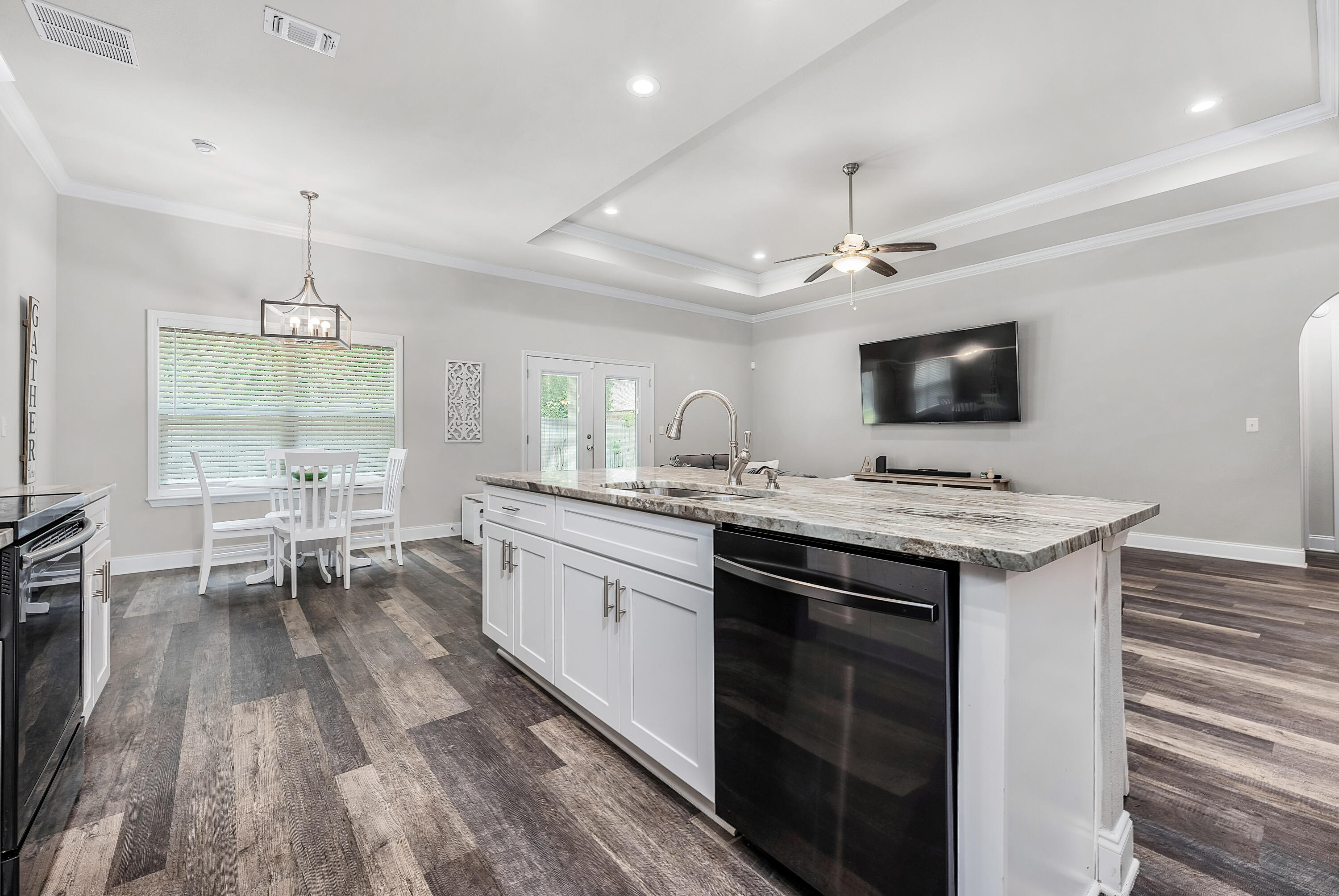 820 Hilltop Road Mary Esther, FL 32569 - Photo 23 of 47 a kitchen with a sink and stove top oven
