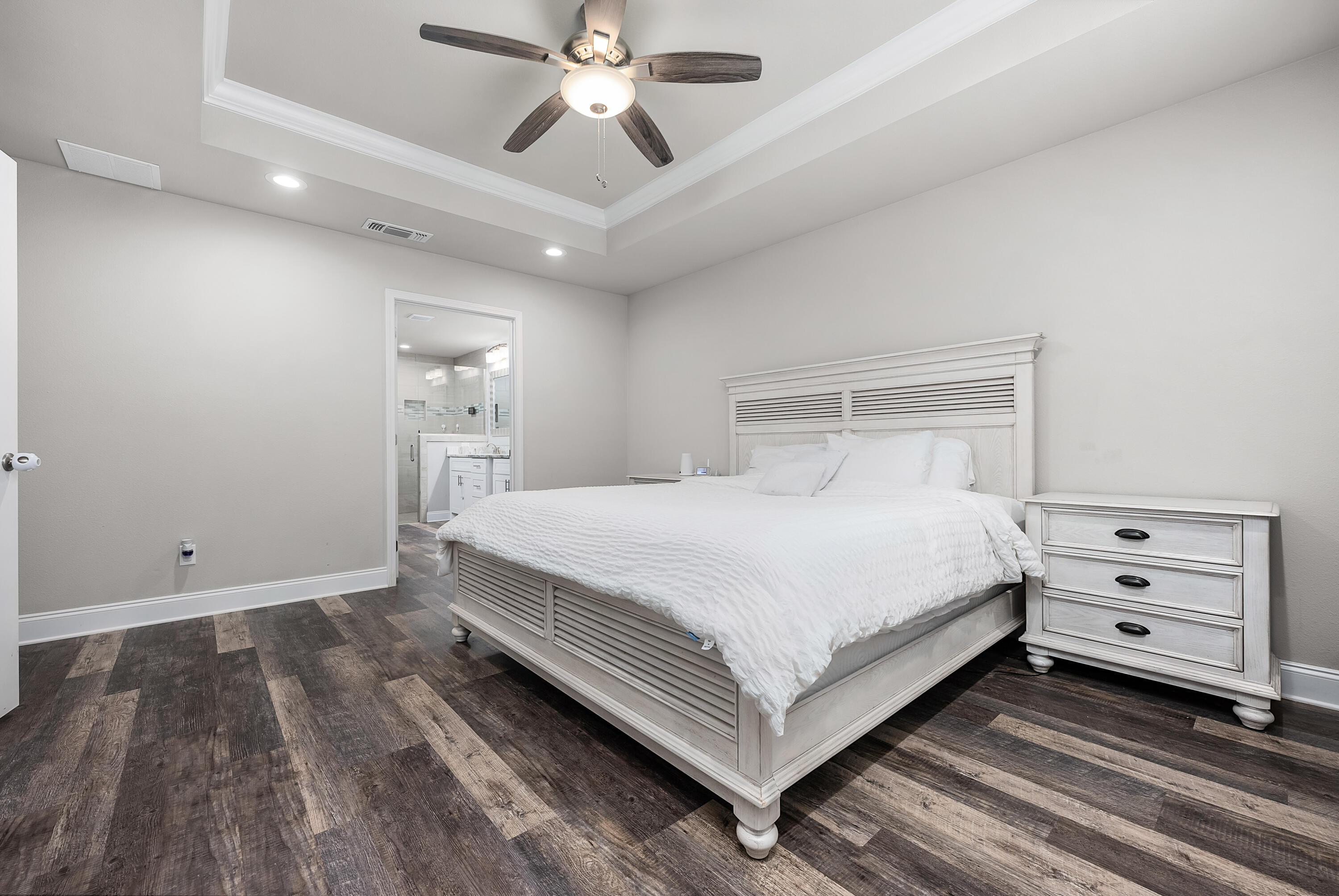 820 Hilltop Road Mary Esther, FL 32569 - Photo 33 of 47 a bedroom with a bed and a chandelier