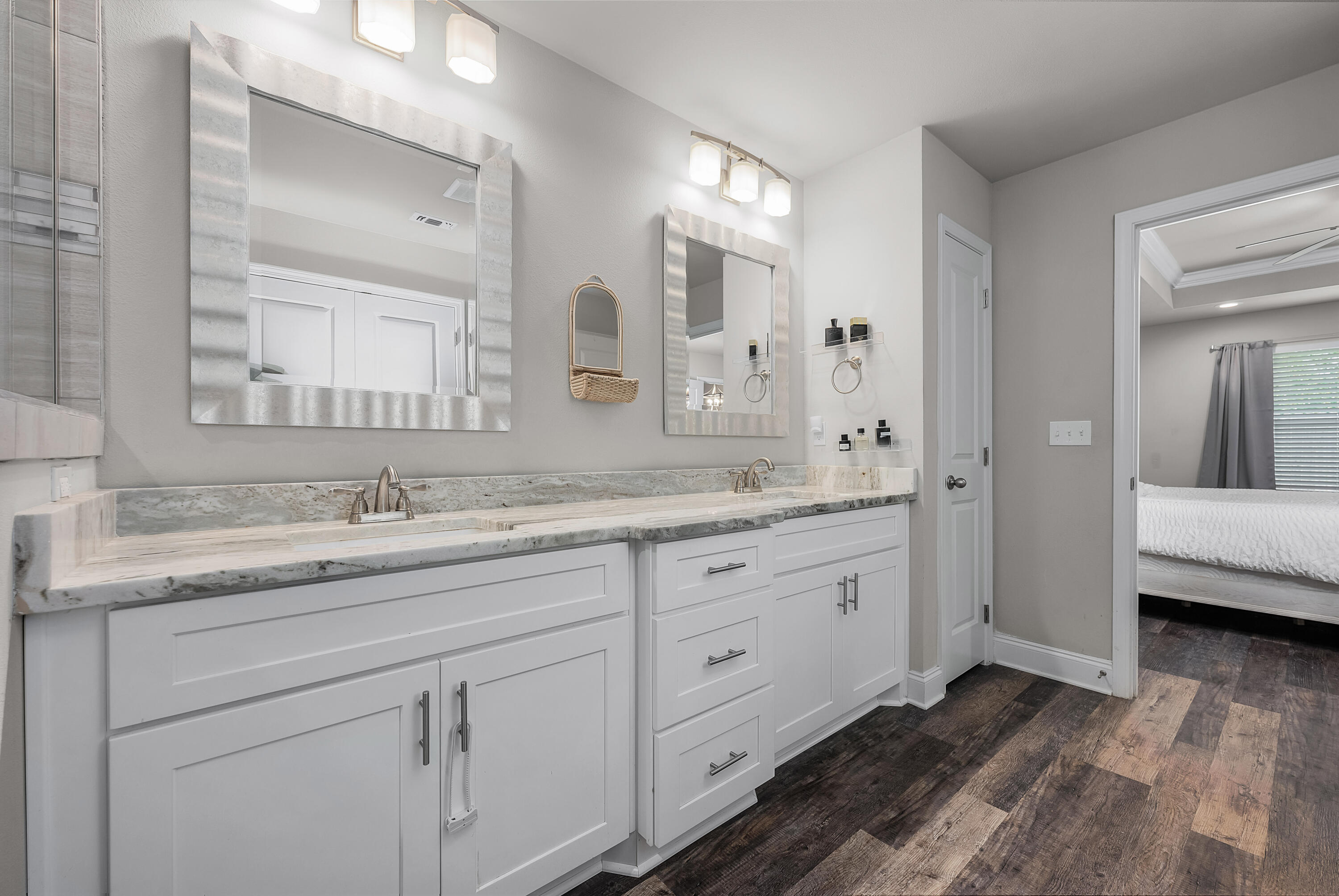 820 Hilltop Road Mary Esther, FL 32569 - Photo 37 of 47 a bathroom with a granite countertop double vanity sink mirror and