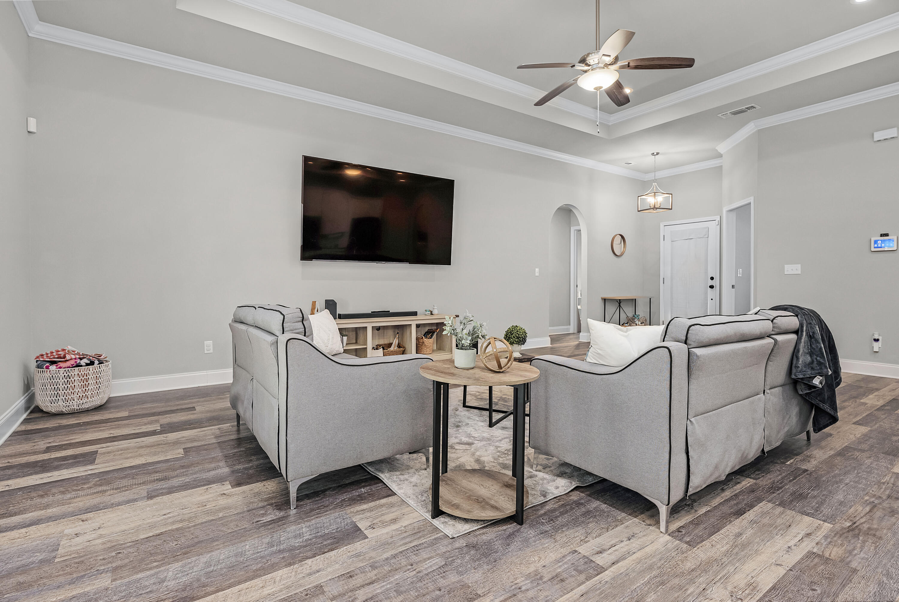 820 Hilltop Road Mary Esther, FL 32569 - Photo 41 of 47 a living room with furniture and a flat screen tv
