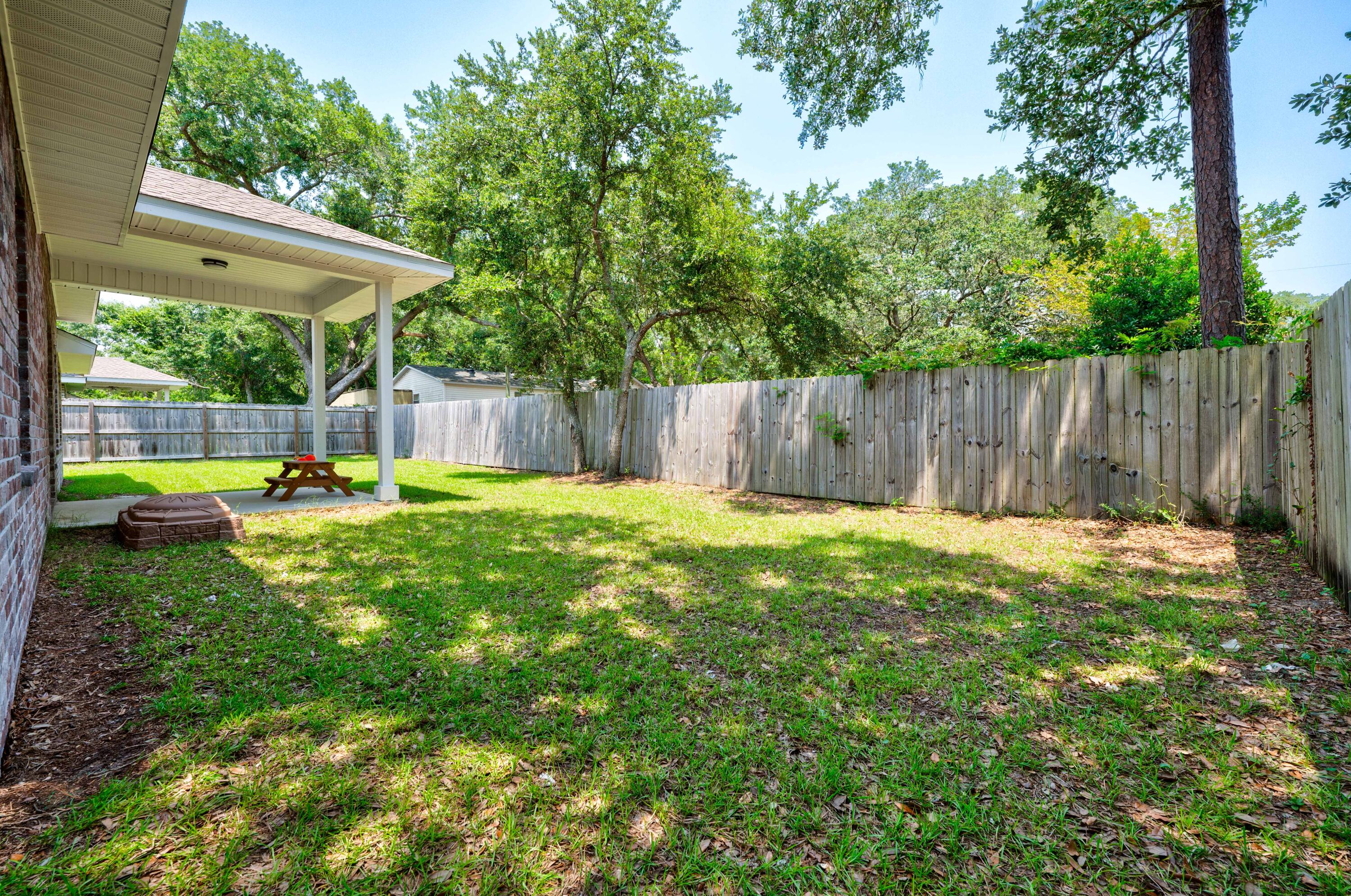820 Hilltop Road Mary Esther, FL 32569 - Photo 42 of 47 a view of swimming pool with a backyard