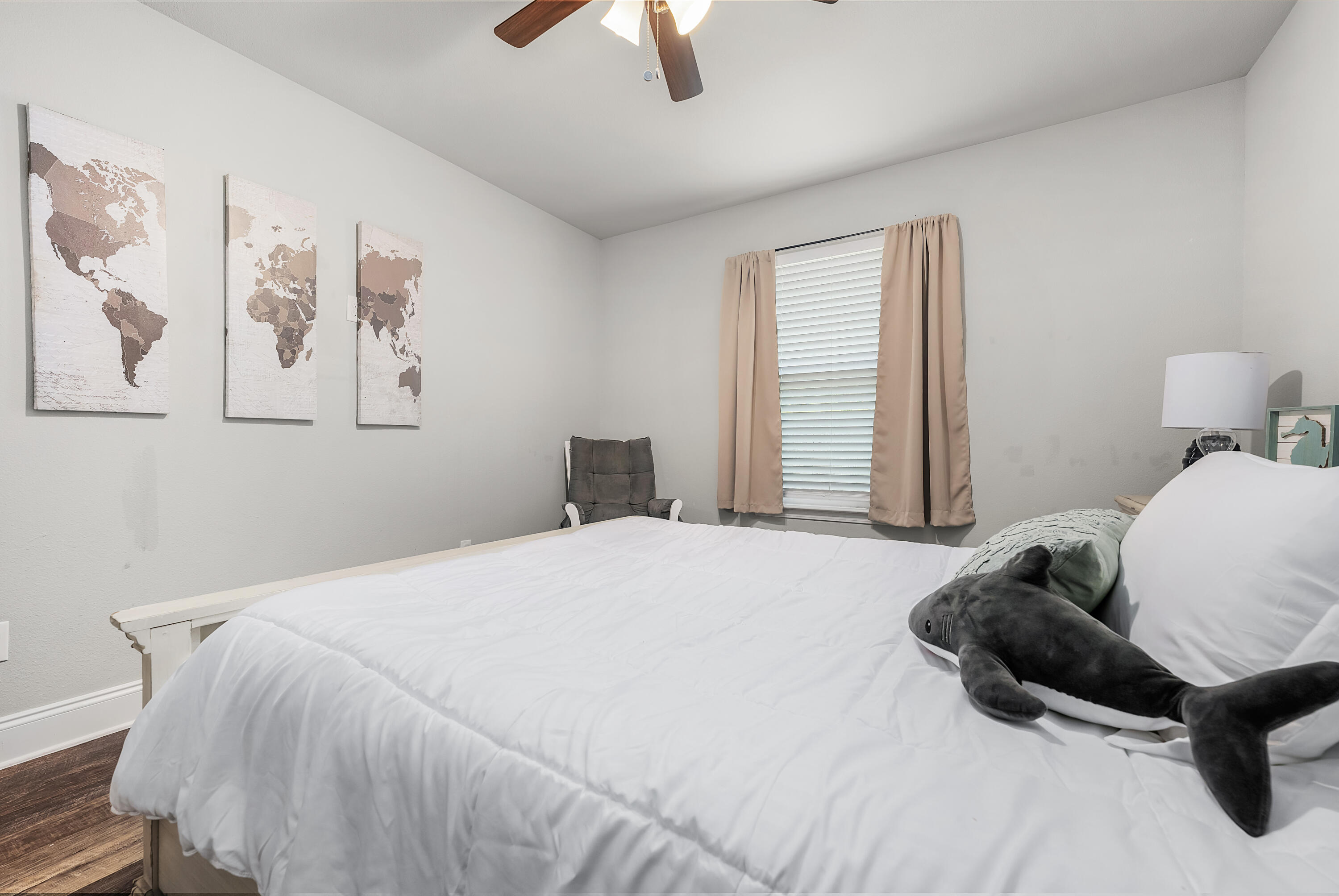 820 Hilltop Road Mary Esther, FL 32569 - Photo 7 of 47 a bedroom with a bed and painting on the wall