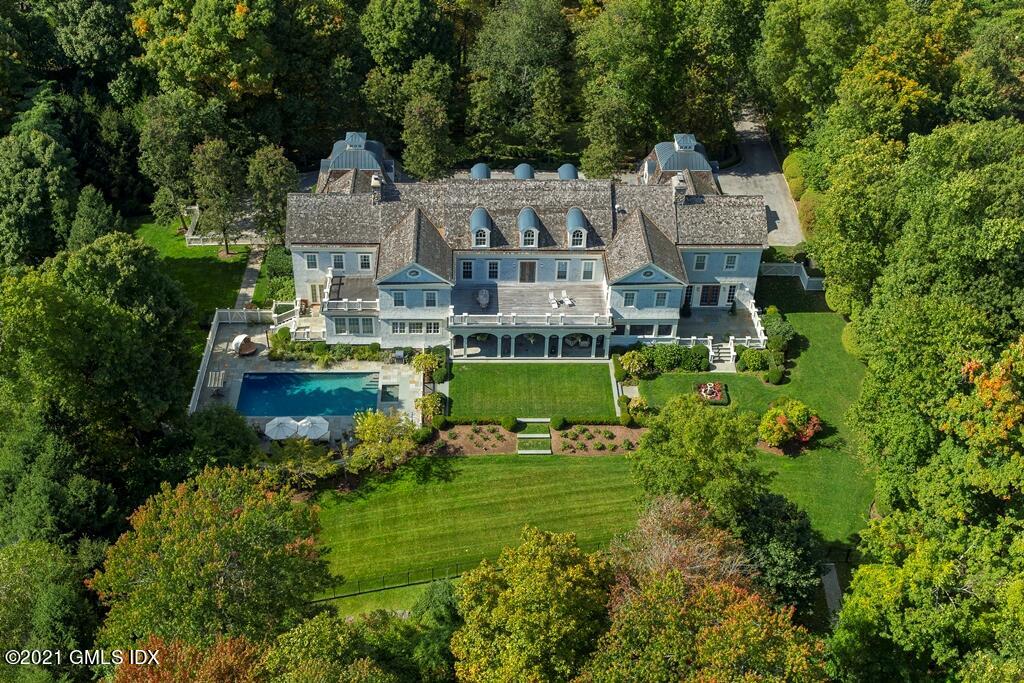 an aerial view of a house with a garden