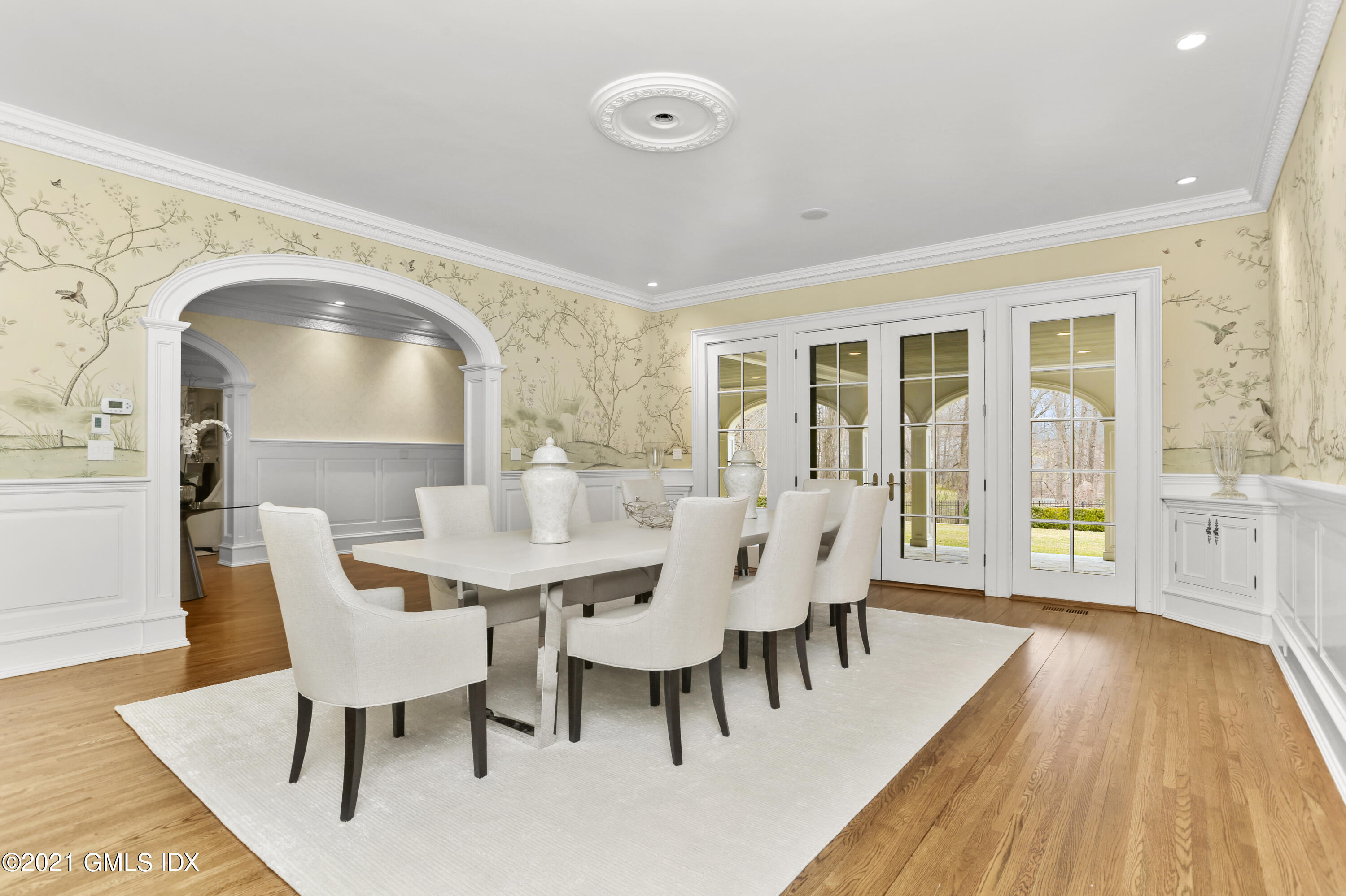 65 Clapboard Ridge Road Greenwich, CT 06830 - Photo 11 of 36 a view of a dining room with furniture and wooden floor