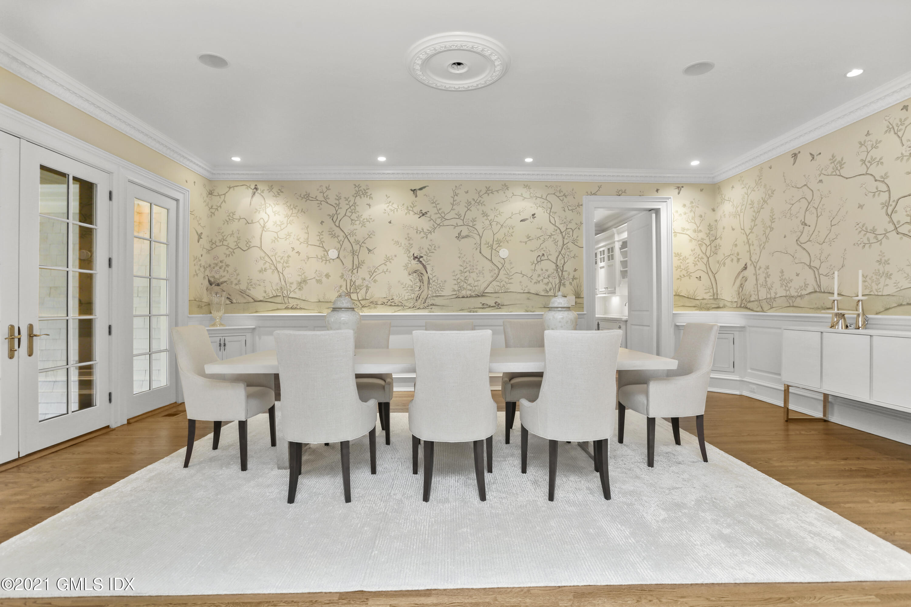 65 Clapboard Ridge Road Greenwich, CT 06830 - Photo 12 of 36 a view of a dining room with furniture and wooden floor
