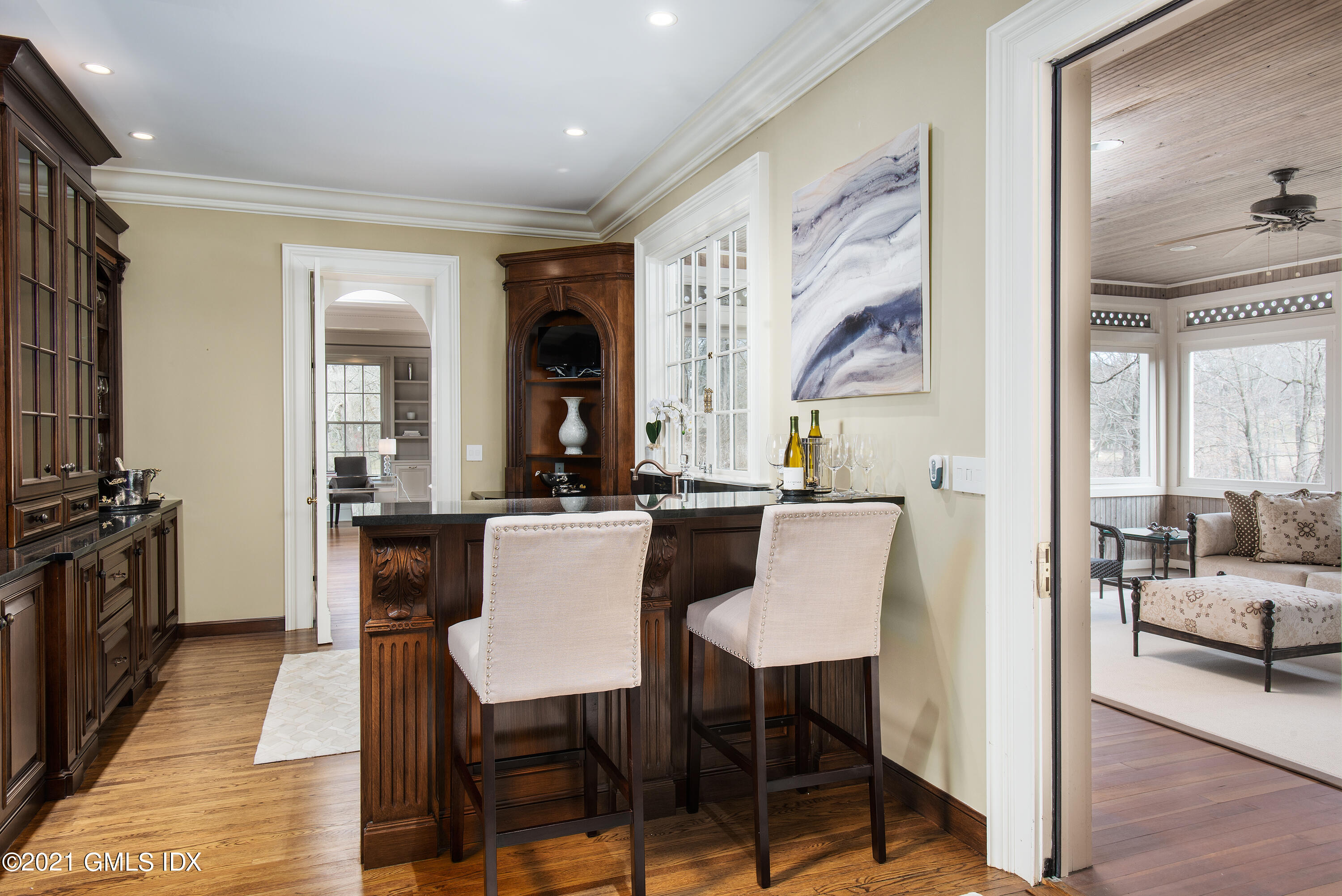 65 Clapboard Ridge Road Greenwich, CT 06830 - Photo 21 of 36 a view of a dining room with furniture window and wooden floor
