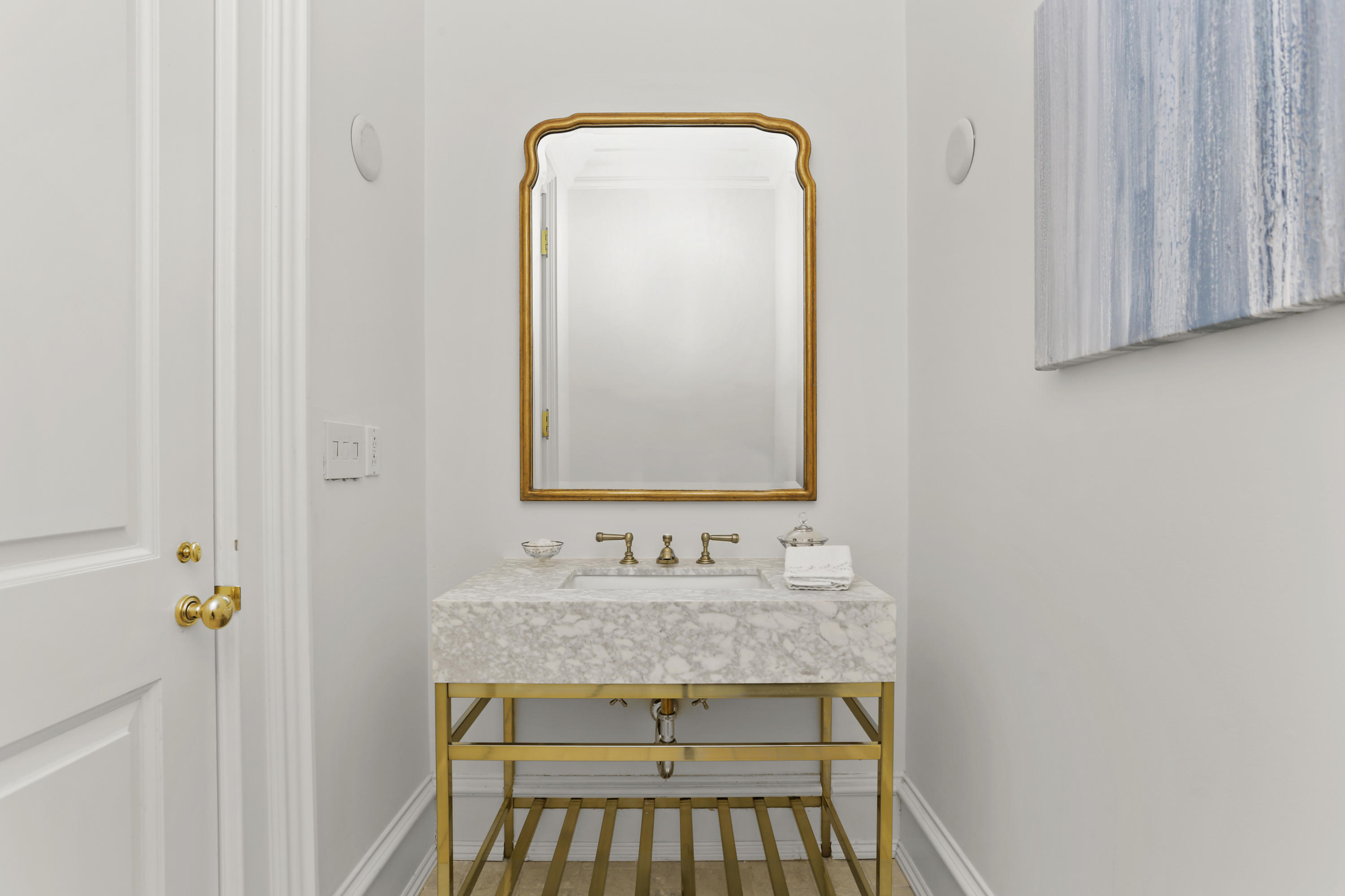 65 Clapboard Ridge Road Greenwich, CT 06830 - Photo 31 of 36 a bathroom with a granite countertop sink and a mirror