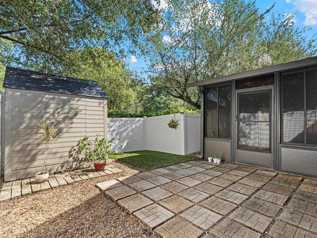 549 Placid Run Road Orange City, FL 32763 - Photo 19 of 20 a backyard of a house with lots of green space