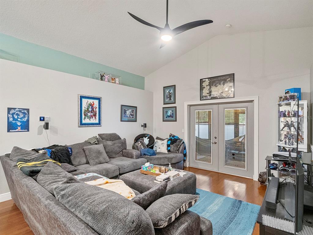 549 Placid Run Road Orange City, FL 32763 - Photo 4 of 20 a living room with furniture and a couch