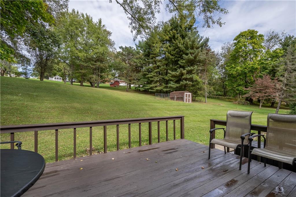 445 Springdale Road Eighty Four, PA 15330 - Photo 8 of 20 a view of a deck with two chair and table