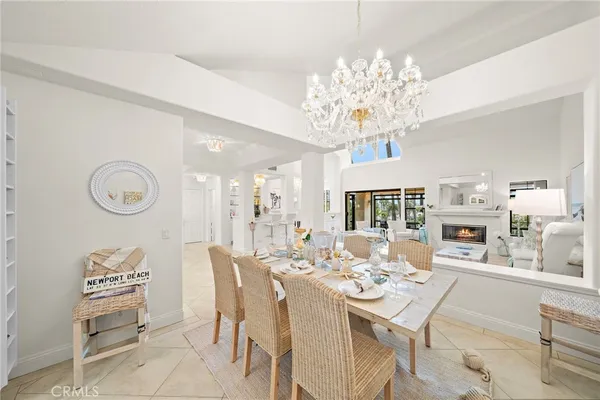 a kitchen with a sink a stove and cabinets