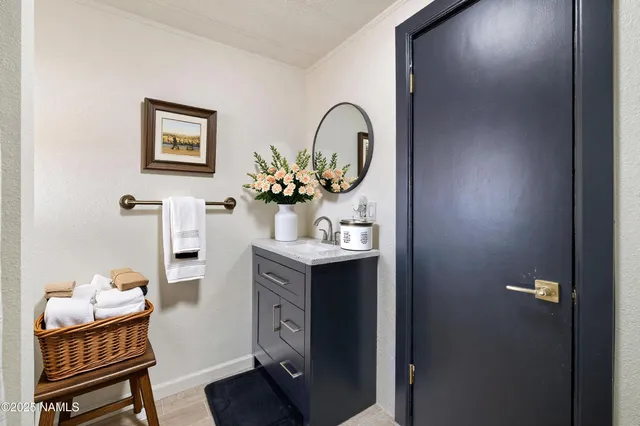 a view of living room with furniture and wooden floor