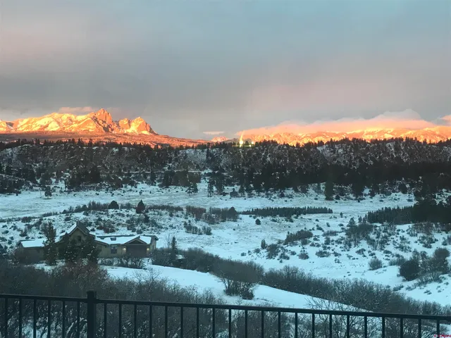 a view of a lake with a mountain in the background