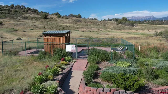 an aerial view of a house with outdoor space