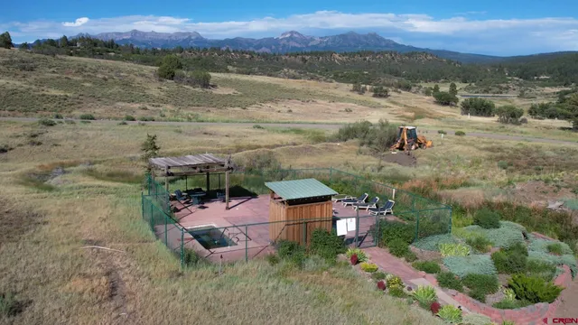 a view of a chairs and table in the terrace
