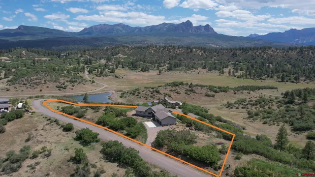 a view of a mountain with a park