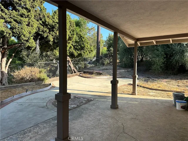 a view of a room with porch and a yard