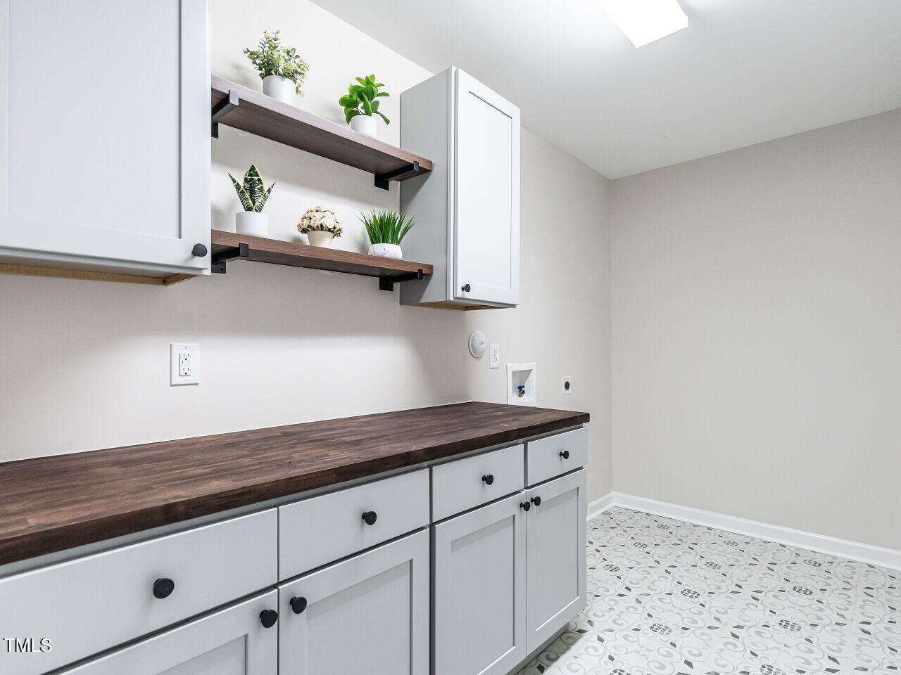 121 Inwood Forest Drive Raleigh, NC 27603 - Photo 43 of 55 2nd Floor Laundry Room