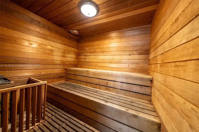 a view of a swimming pool with a lounge chairs