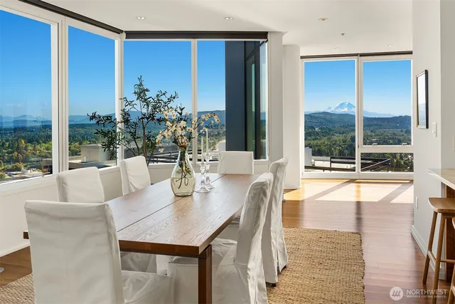 a view of a dining room with furniture window and outside view