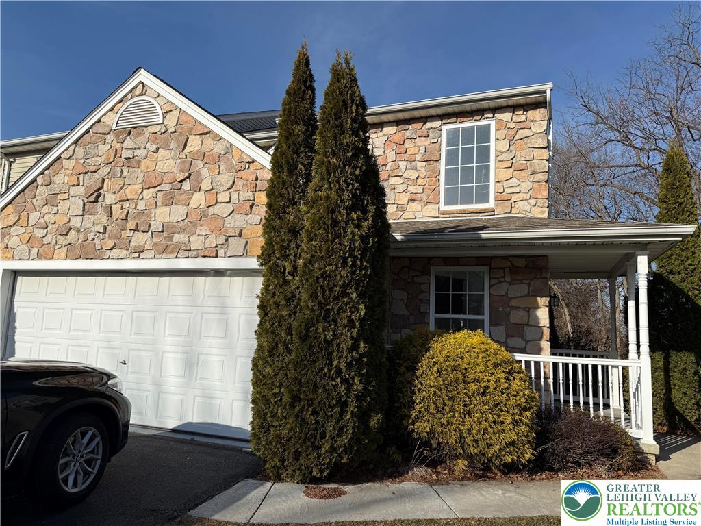 a view of a house with a window and balcony