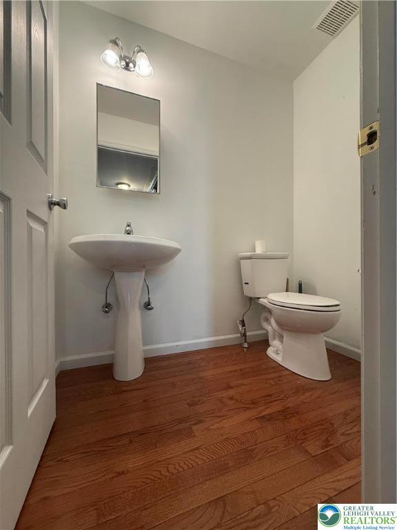 4141 Walter Road Bethlehem, PA 18020 - Photo 12 of 34 a bathroom with a sink toilet and a mirror