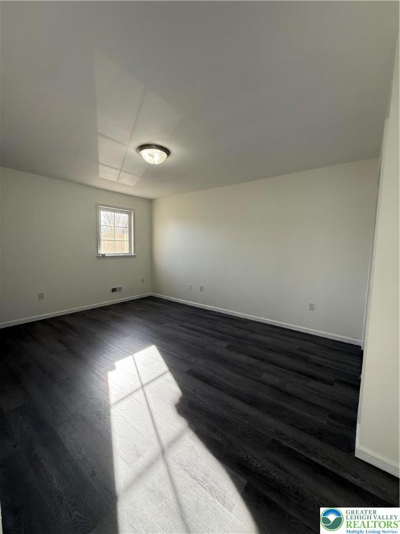 4141 Walter Road Bethlehem, PA 18020 - Photo 19 of 34 an empty room with wooden floor and windows