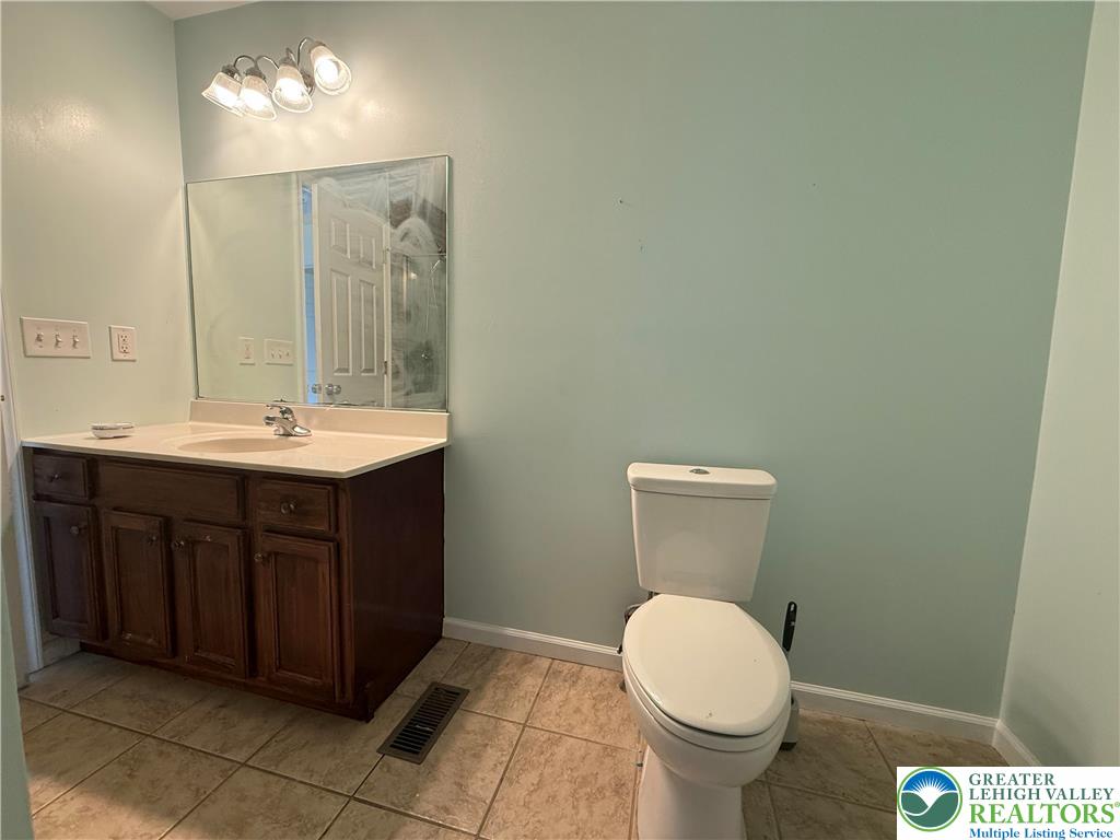 4141 Walter Road Bethlehem, PA 18020 - Photo 20 of 34 a bathroom with a sink and a toilet