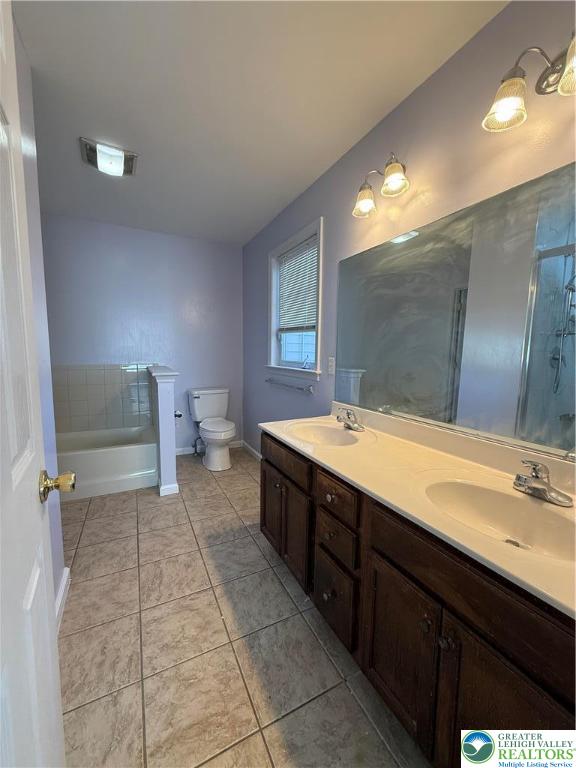 4141 Walter Road Bethlehem, PA 18020 - Photo 24 of 34 a spacious bathroom with a double vanity sink a toilet and a mirror