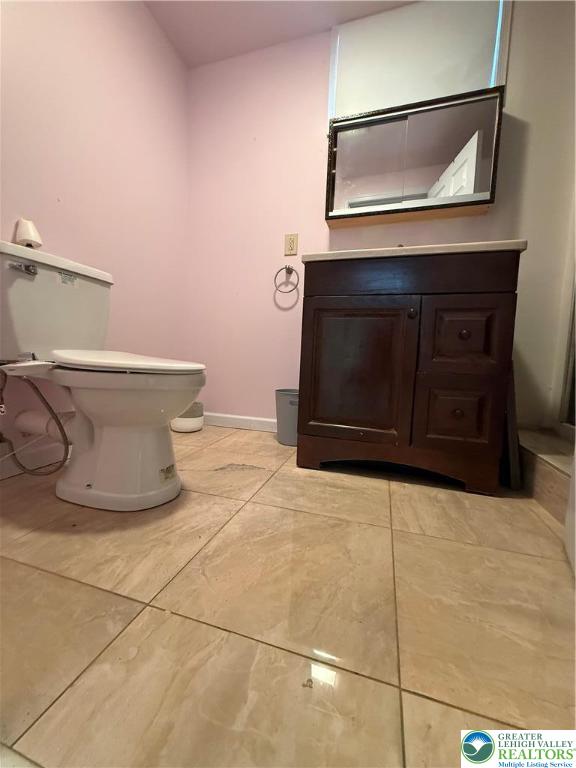 4141 Walter Road Bethlehem, PA 18020 - Photo 31 of 34 a bathroom with a toilet and a mirror