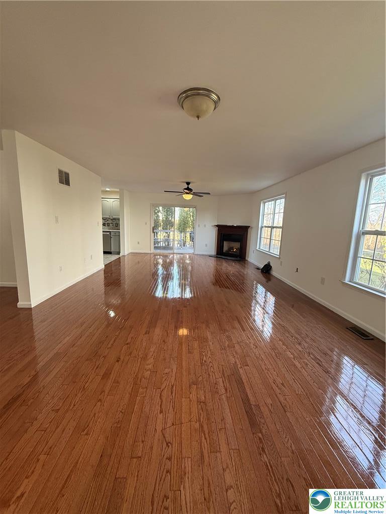 4141 Walter Road Bethlehem, PA 18020 - Photo 9 of 34 wooden floor in an empty room with a window