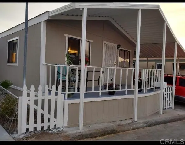 a view of balcony and kitchen view