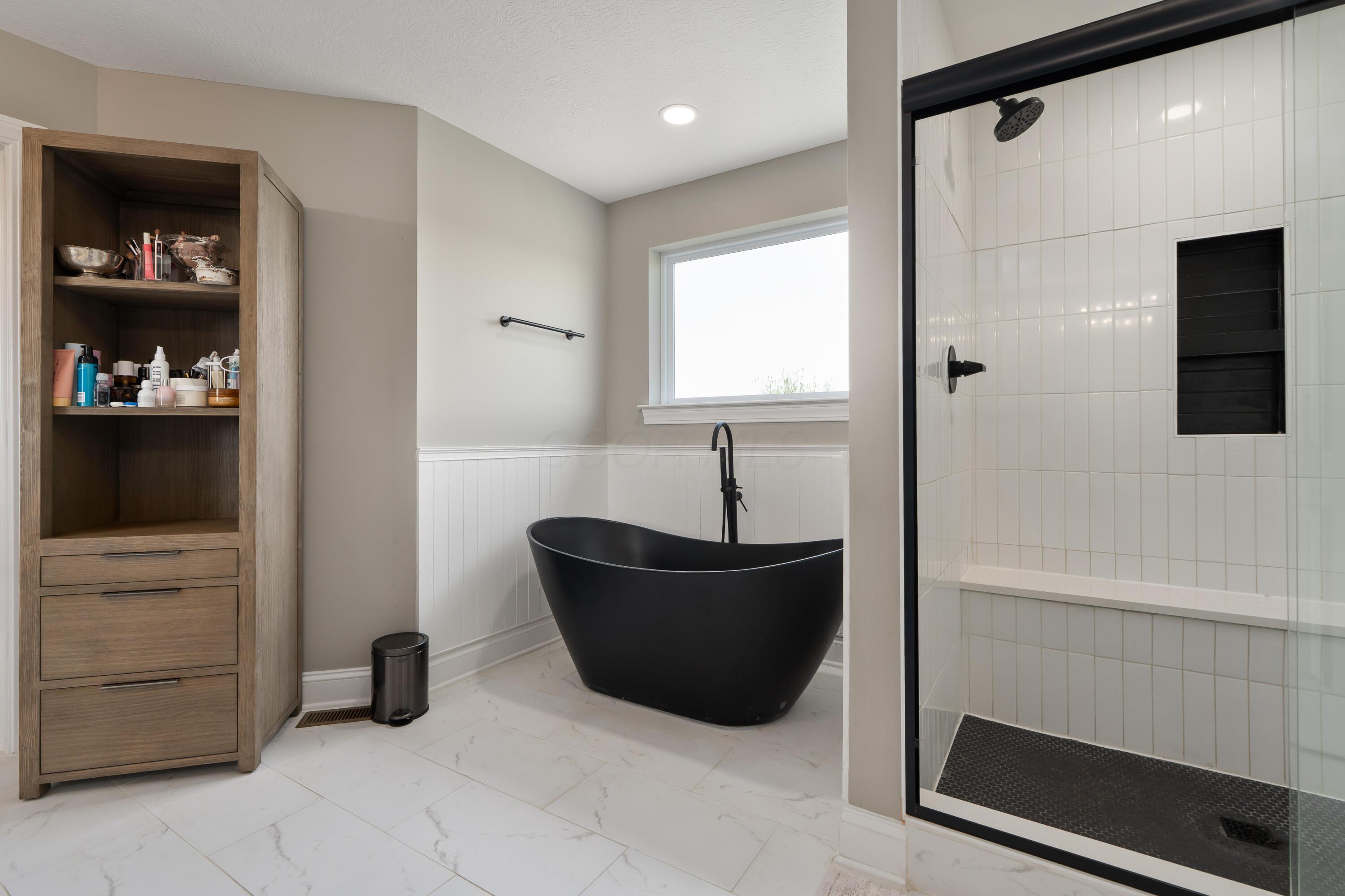 7308 Concord Road Delaware, OH 43015 - Photo 38 of 73 Primary Bedroom En Suite Bathroom with soaking tub