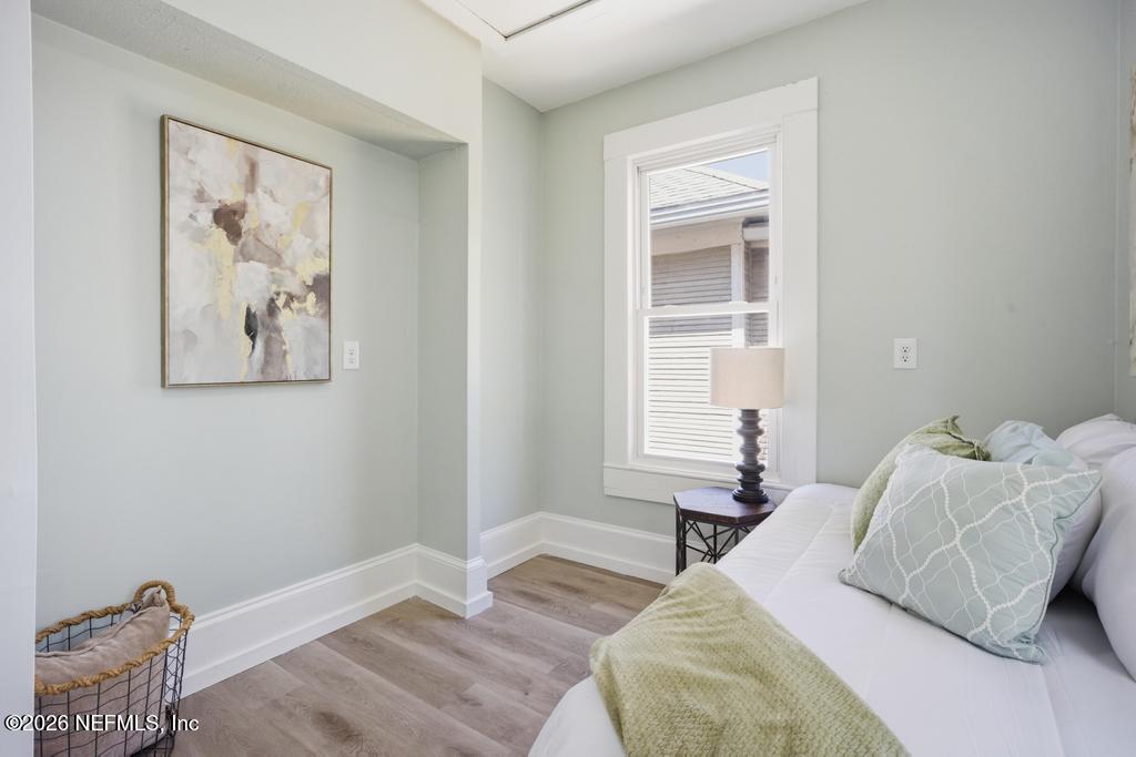 1825 Perry Street Jacksonville, FL 32206 - Photo 25 of 80 a bedroom with a bed and a window