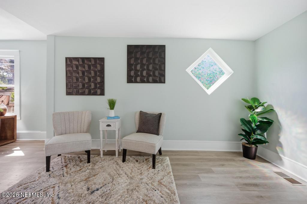 1825 Perry Street Jacksonville, FL 32206 - Photo 29 of 80 a living room with furniture and a potted plant
