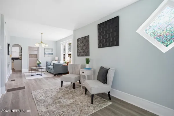 a bedroom with bed and window