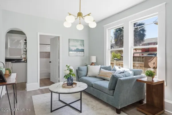 a bedroom with a bed and a table