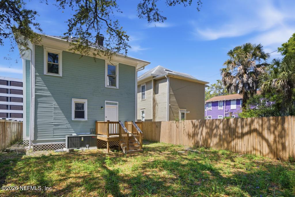 1825 Perry Street Jacksonville, FL 32206 - Photo 56 of 80 a backyard of a house with table and chairs