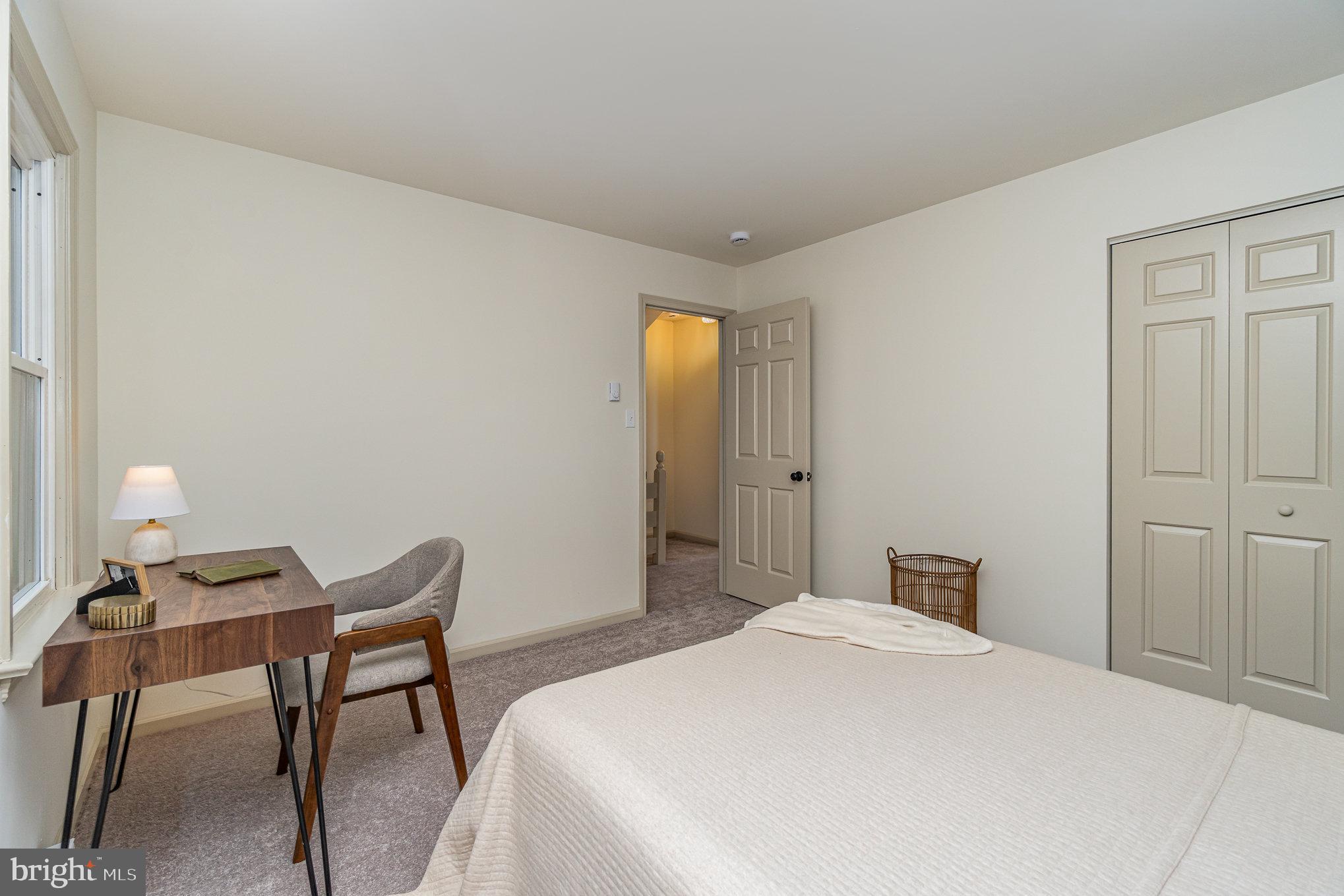 1638 Chadwick Circle Lancaster, PA 17603 - Photo 13 of 25 a bedroom with a bed and a table in it